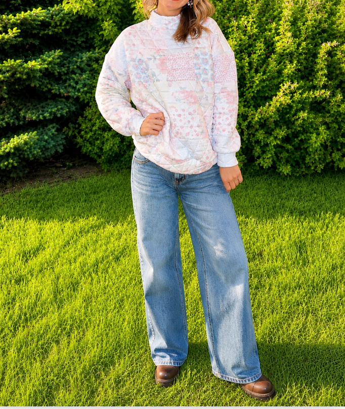 Floral textured mock neck sweater