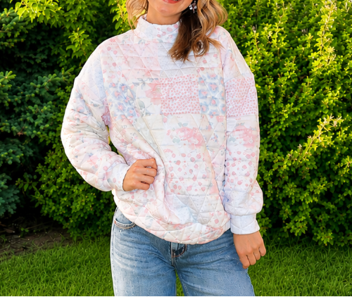 Floral textured mock neck sweater